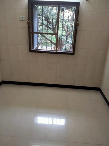 Room in 1 BHK Apartment at Namo Shanti Dham CHS, Borivali West – for Rent