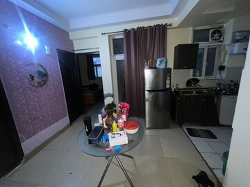 Living Room in 2 BHK Apartment at Amrapali Silicon City, Sector 76 – for Rent