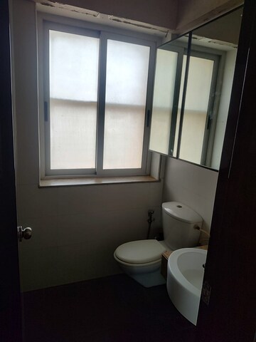 Bathroom in 2 BHK Apartment at Jasmine Tower, Vasant Vihar – for Rent