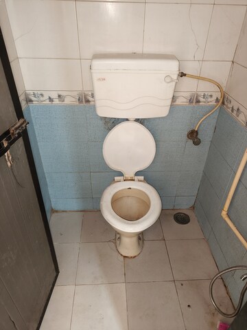 Bathroom in 2 BHK Apartment at Seawoods Sector 44 – for Rent