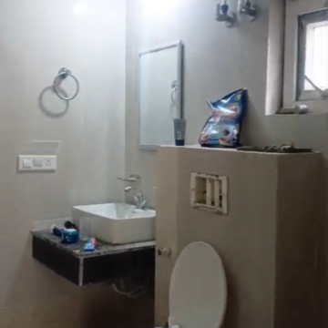 Bathroom in 3.5 BHK Apartment at Sikka Kaamna Greens, Sector 143 – for Rent
