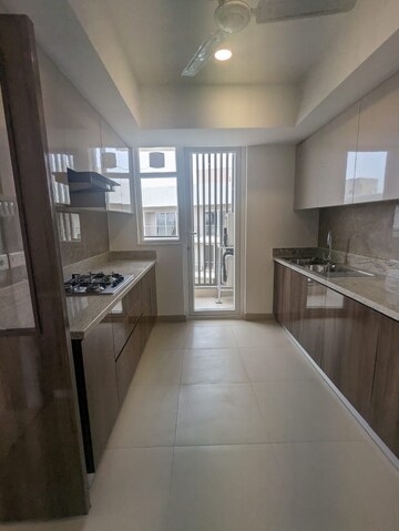 Kitchen in 4 BHK Apartment at DLF Garden City Independent Floors, Sector 92 – for Rent