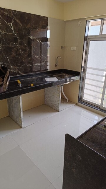 Kitchen in 2 BHK Apartment at Romell Shraddha, Borivali West – for Rent