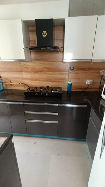 Kitchen in 2 BHK Apartment at Aditya Urban Casa, Sector 78 – for Rent