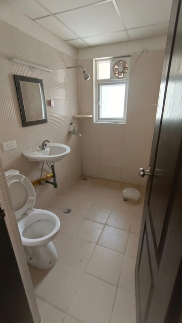 Bathroom in 2 BHK Apartment at Aditya Urban Casa, Sector 78 – for Rent