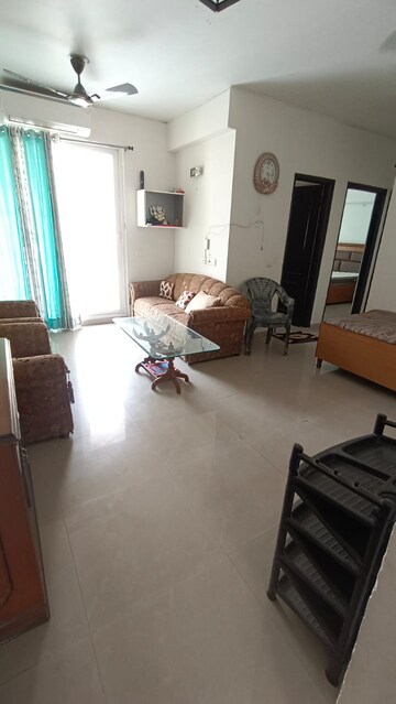 Living Room in 2 BHK Apartment at Aditya Urban Casa, Sector 78 – for Rent