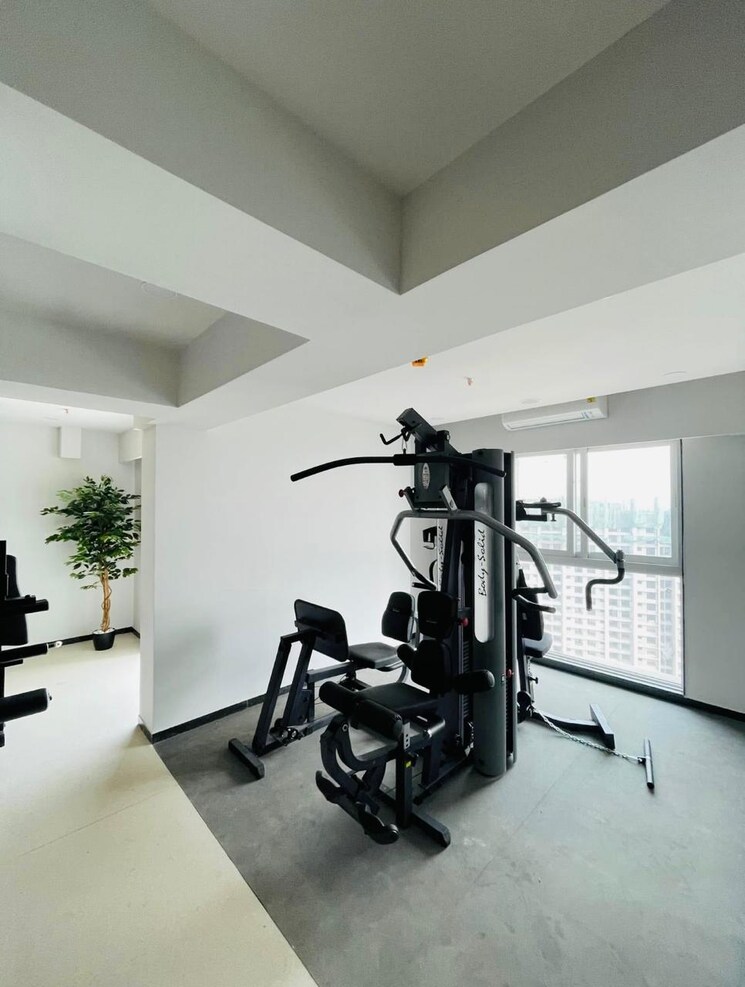 Gym, ashar-axis 2 Bedroom 678 Sq.Ft. Apartment In Majiwada Thane 8909539