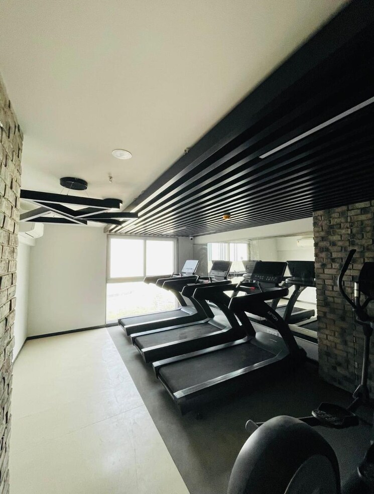 Gym, ashar-axis 2 Bedroom 678 Sq.Ft. Apartment In Majiwada Thane 8909539