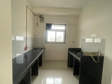 Kitchen in 2 BHK Apartment at Ashar Axis, Majiwada – for Rent