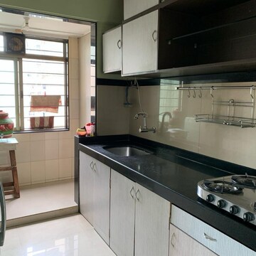 Kitchen in 2 BHK Apartment at Mahavir Universe Stellar CHS, Kukreja – for Rent