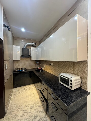 Kitchen in 2.5 BHK Apartment at Madhur Apartment, Paschim Vihar – for Rent