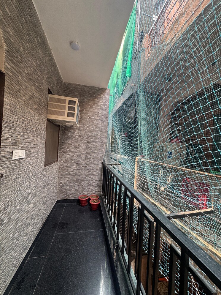 Balcony, madhur-apartment 2.5 Bedroom 1000 Sq.Ft. Apartment In Paschim Vihar Delhi 8909643