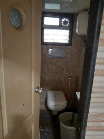 Bathroom in 2 BHK Apartment at Harjas CHS, Ic Colony – for Rent