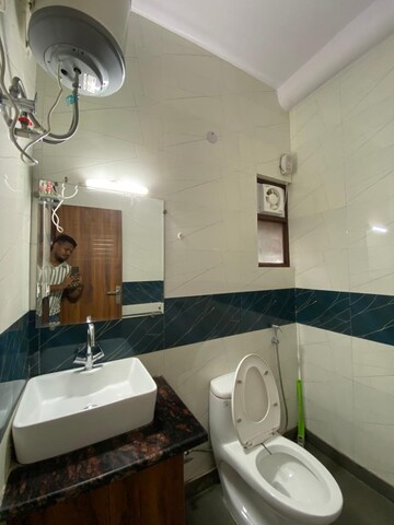 Bathroom in 2.5 BHK Apartment at Triveni Apartments CGHS, Paschim Vihar – for Rent
