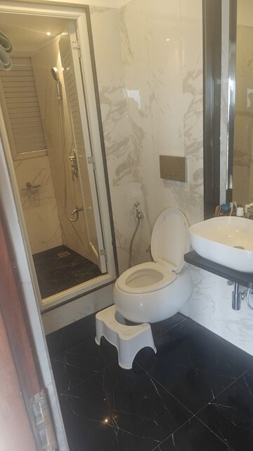 Bathroom in 2 BHK Apartment at Ruparel Ariana, Parel – for Rent