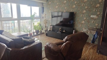 Living Room in 2 BHK Apartment at Ruparel Ariana, Parel – for Rent