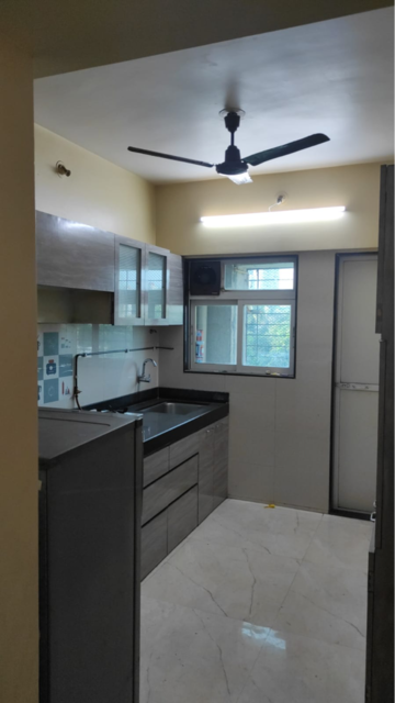 Kitchen in 2 BHK Apartment at Cosmos Habitat, Yashaswi Nagar – for Rent
