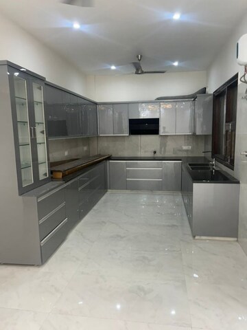 Kitchen in 3.5 BHK Builder Floor at Ansal API Esencia, Sector 67 – for Sale