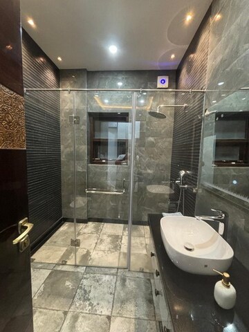 Bathroom in 3.5 BHK Builder Floor at Ansal API Esencia, Sector 67 – for Sale