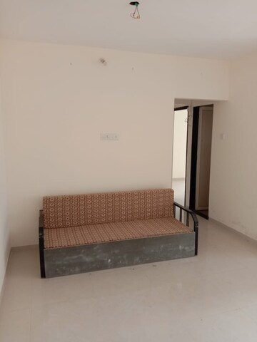 Room in 2 BHK Apartment at Rajendra Dolphin Tower, Malad West – for Rent