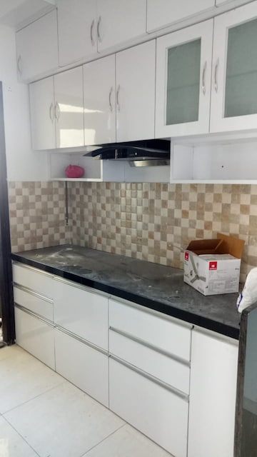 Kitchen in 2 BHK Apartment at Mahindra Antheia, Pimpri – for Rent