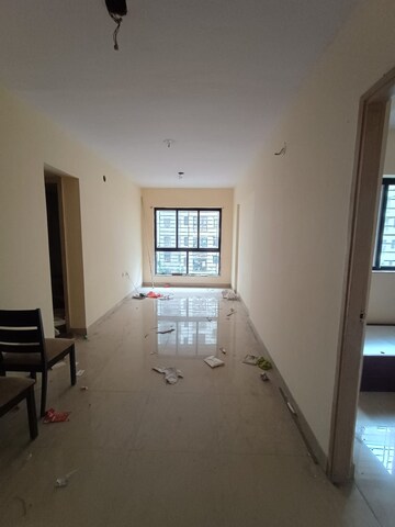 Living Room in 1 BHK Apartment at Lodha Palava Crown, Dombivli East – for Rent