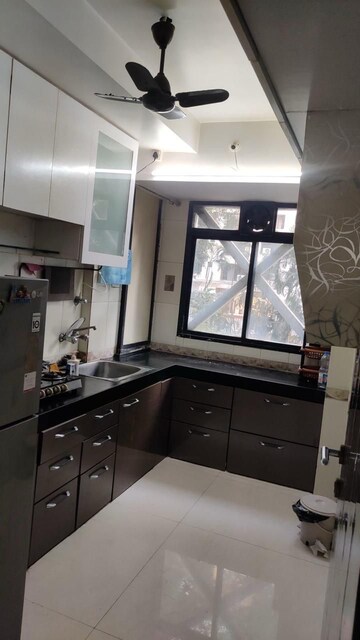 Kitchen in 1 BHK Apartment at Hiranandani Gardens Canna, Powai – for Rent