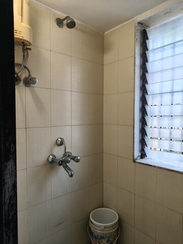 Bathroom in 1 BHK Apartment at Sai Milan CHS, Worli – for Rent