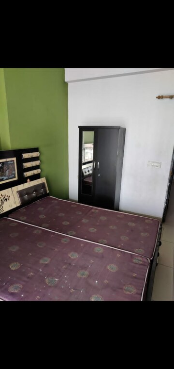 Bedroom in 3 BHK Apartment at Mahagun Mascot, Sain Vihar – for Rent
