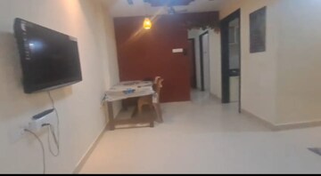 Living Room in 2 BHK Apartment at Arjun CHS Vasant Vihar, Vasant Vihar – for Rent