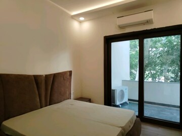 Bedroom in 4 BHK Builder Floor at Ansal Sushant Apartments, Sushant Lok I – for Rent