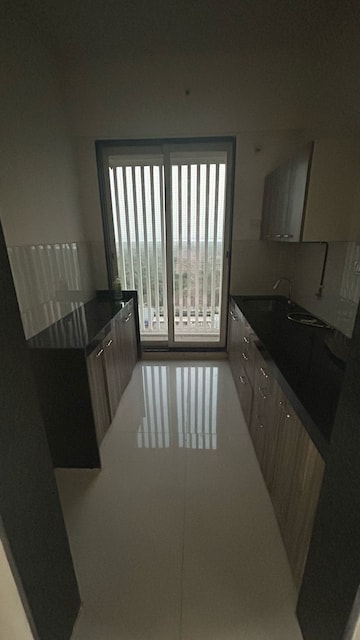 Kitchen in 1 BHK Apartment at Bhairaav Goldcrest Residency, Ghansoli – for Rent