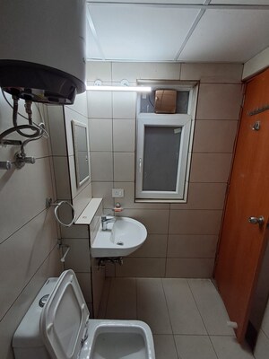 Bathroom in 3 BHK Apartment at Aditya Mega City, Vaibhav Khand – for Sale
