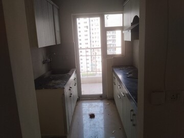 Kitchen in 2.5 BHK Apartment at VVIP Homes, Gaur City 2 – for Rent
