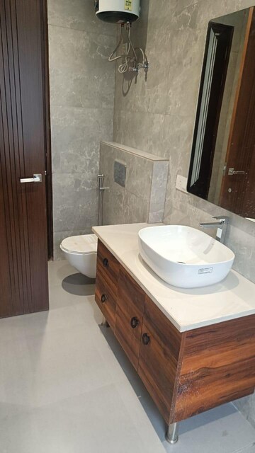 Bathroom in 3.5 BHK Builder Floor at Ansal API Esencia, Sector 67 – for Sale