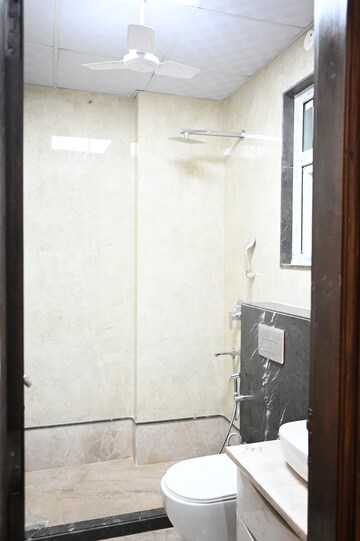 Bathroom in 3.5 BHK Builder Floor at Ansal API Esencia, Sector 67 – for Sale