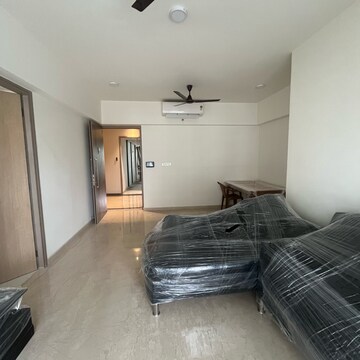 Living Room in 2 BHK Apartment at Lodha Woods, Lokhandwala – for Rent