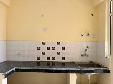 Kitchen in 1 BHK Apartment at Eureka Diya Green City, Raj Nagar Extension – for Rent
