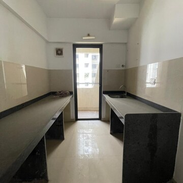 Kitchen in 1 BHK Apartment at Lodha Lakeshore Greens, Hedutane – for Rent