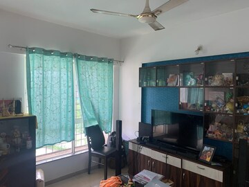 Living Room in 2 BHK Apartment at Kolte Patil Cheryl, Kharadi – for Rent