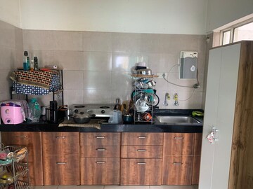 Kitchen in 2 BHK Apartment at Kolte Patil Cheryl, Kharadi – for Rent