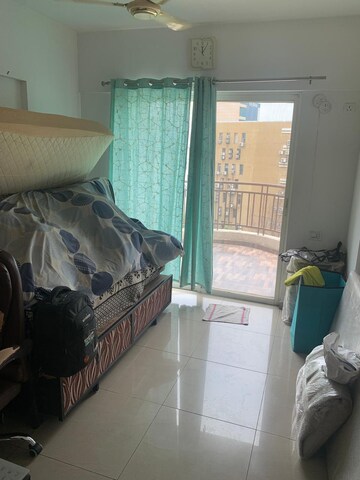 Living Room in 2 BHK Apartment at Kolte Patil Cheryl, Kharadi – for Rent