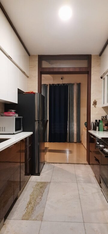Kitchen in 4 BHK Apartment at Aditya Mega City, Vaibhav Khand – for Sale
