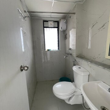 Bathroom in 2 BHK Apartment at Runwal Gardens Phase I, Kalyan Shilphata Road – for Rent