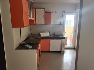 Kitchen in 2 BHK Apartment at Paramount Floraville, Sector 137 – for Sale