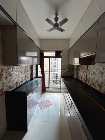Kitchen in 1 BHK Apartment at Cosmos Jewels, Ghodbunder Road – for Rent