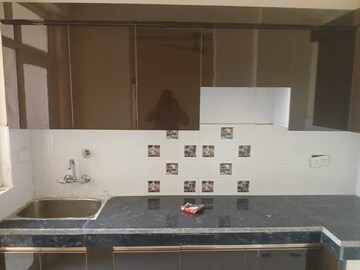 Kitchen in 2 BHK Apartment at Eureka Diya Green City, Raj Nagar Extension – for Sale