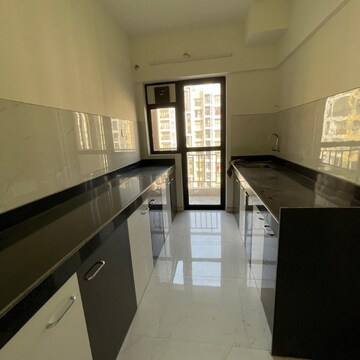 Kitchen in 3 BHK Apartment at Runwal Gardens Phase I, Kalyan Shilphata Road – for Rent