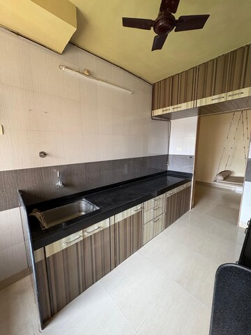 Kitchen in 2 BHK Apartment at Happy Valley, Manpada – for Rent