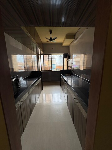 Kitchen in 2 BHK Apartment at Happy Valley, Manpada – for Rent